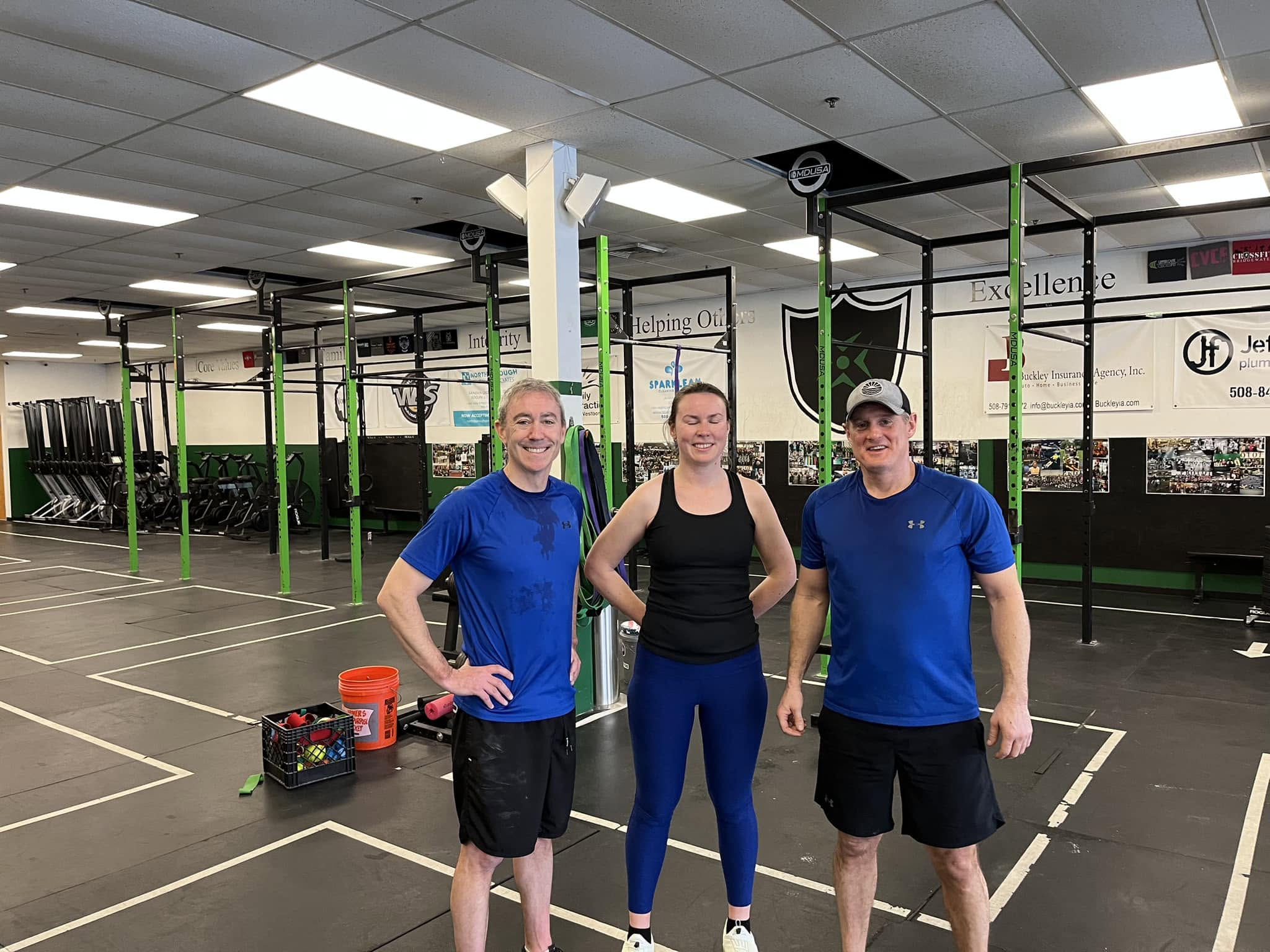 Keith DeJesus and Tim Furbush at the gym in matching workout gear by coincidence