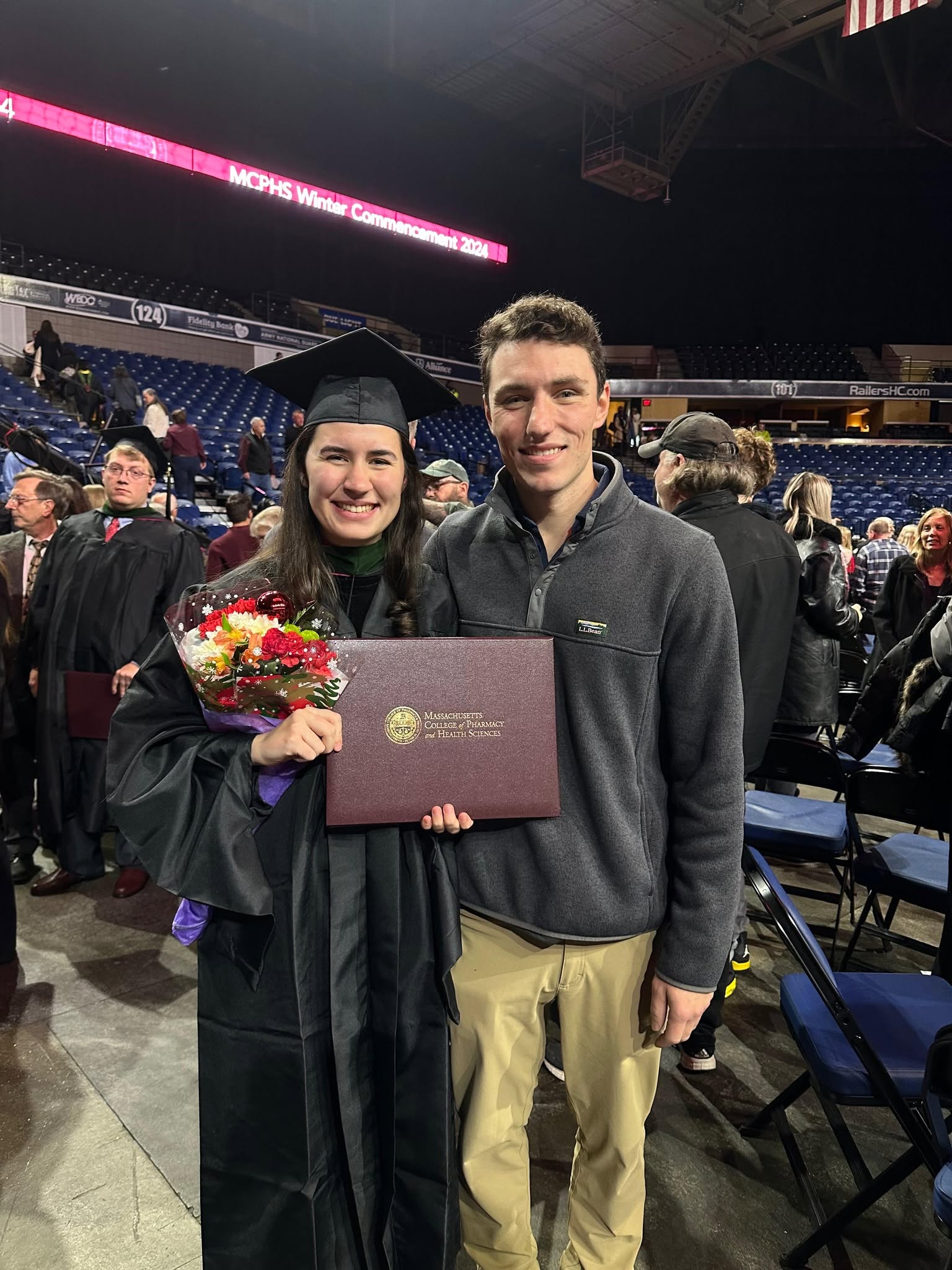 Devon LaMachia at her physician assistant graduation with Ed Matatall