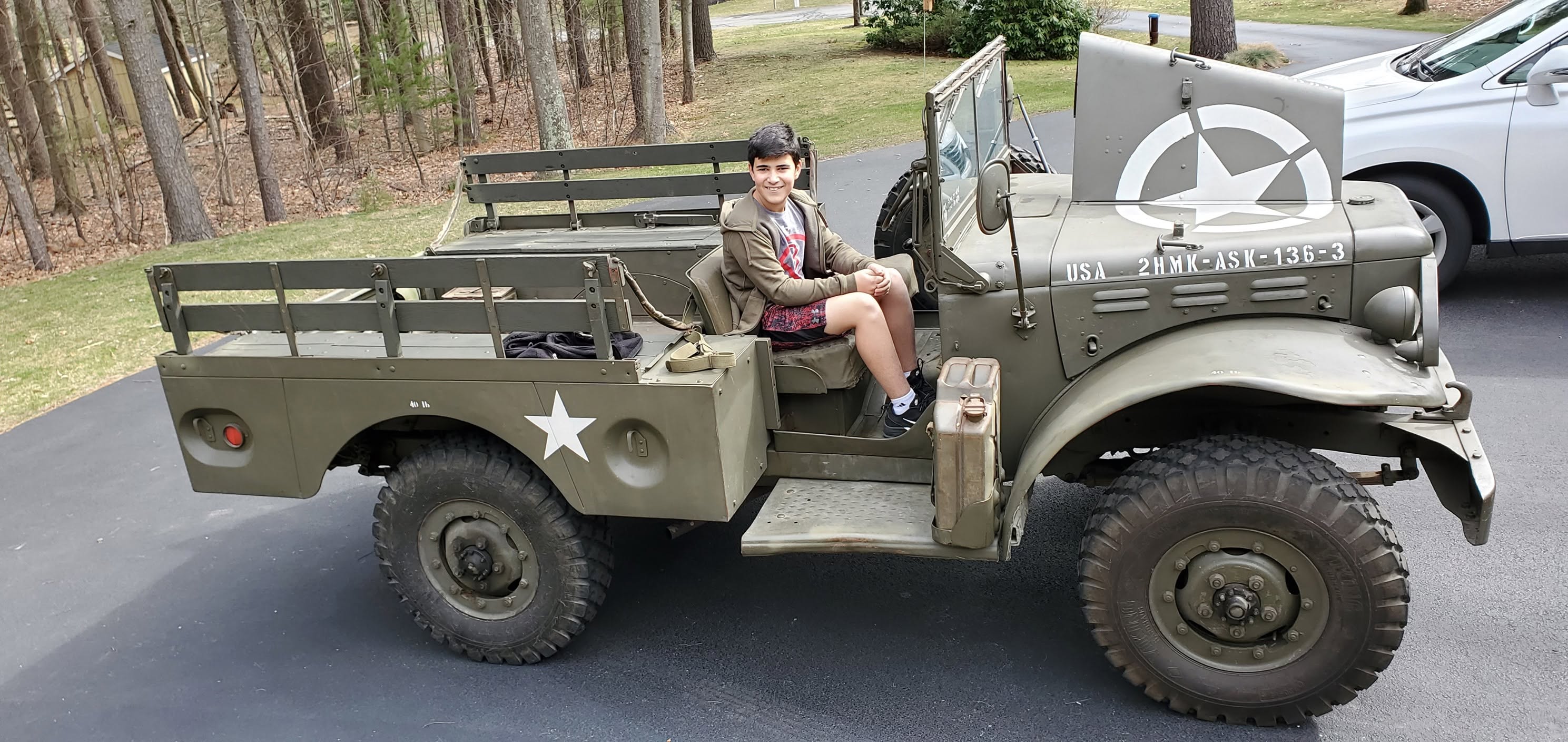 Eric's son Jake in Eric's old military vehicle
