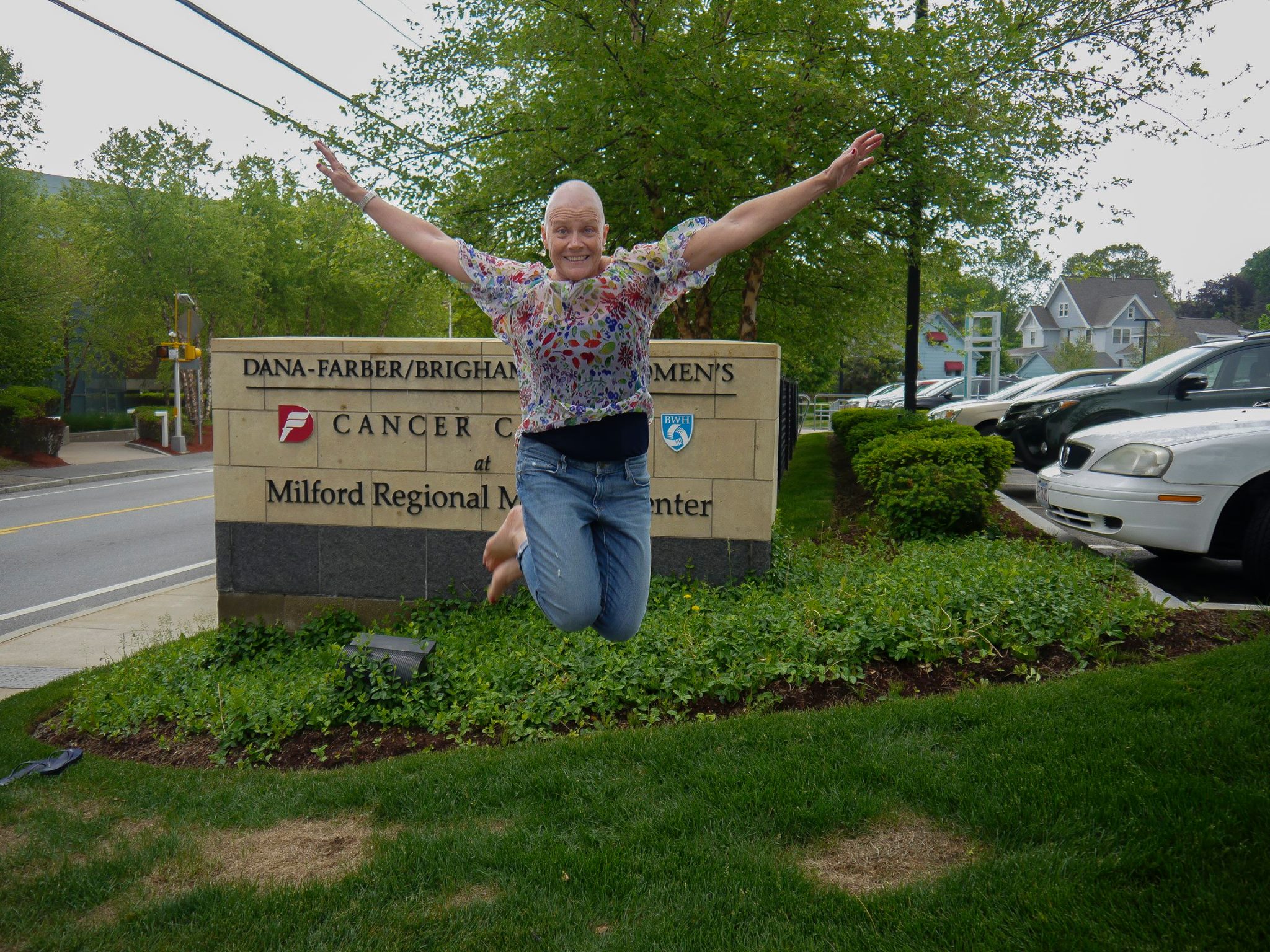 Jean Hanks smiling with her head held high after being cleared of breast cancer