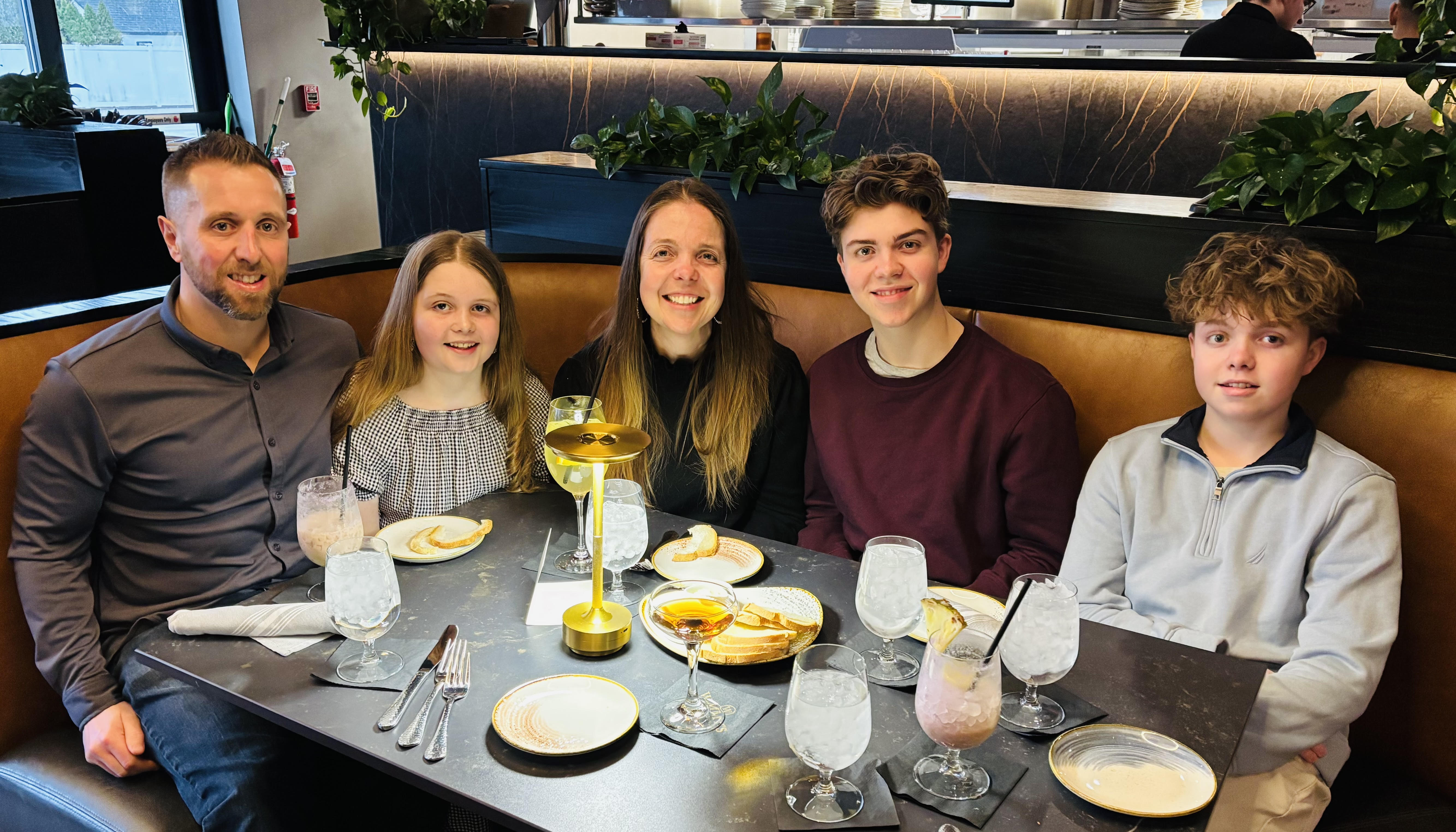 Pat LaCroix with his wife and three kids at dinner the week he joined Prototype