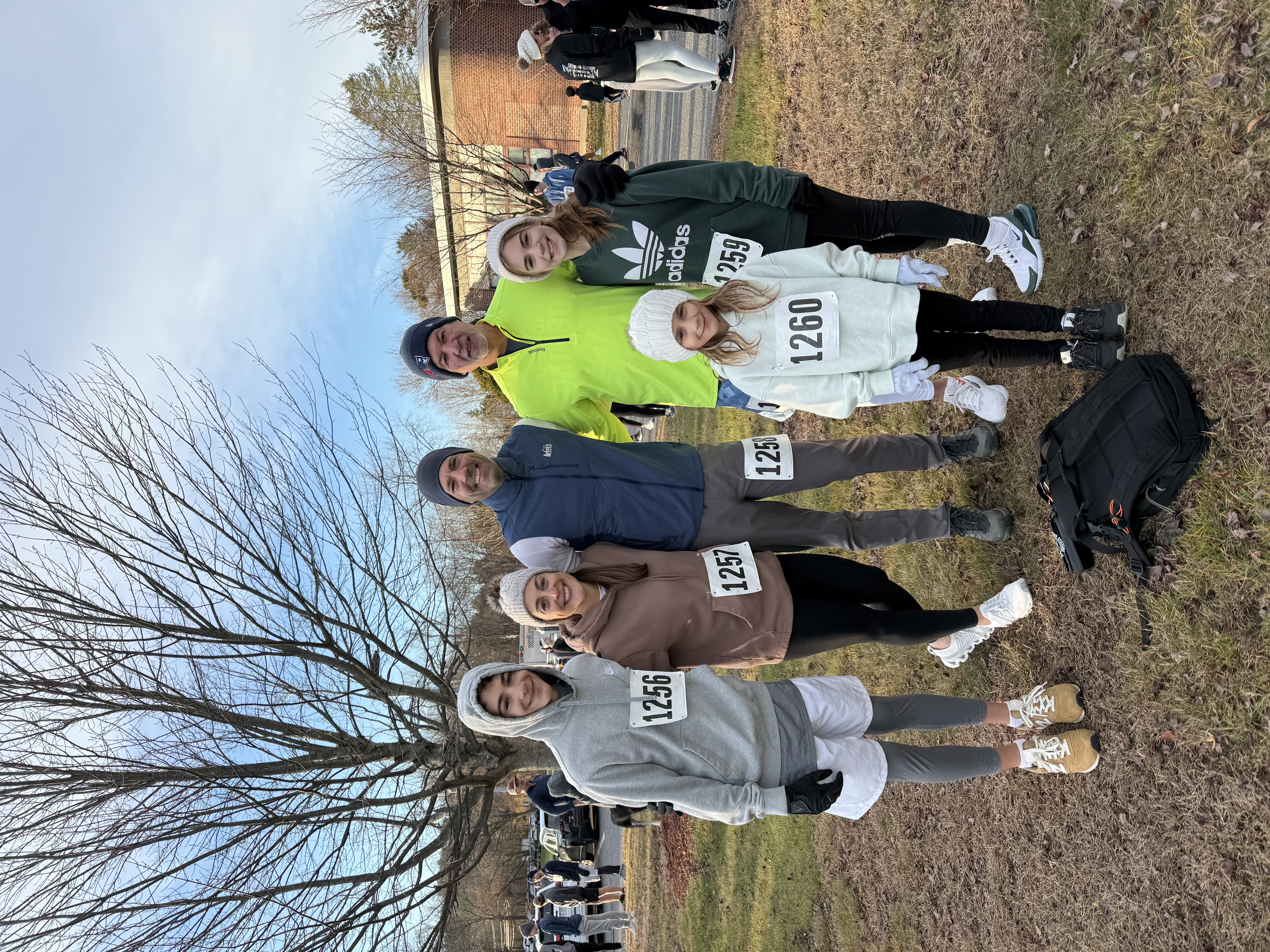 Mark with his family after a race, including his dad