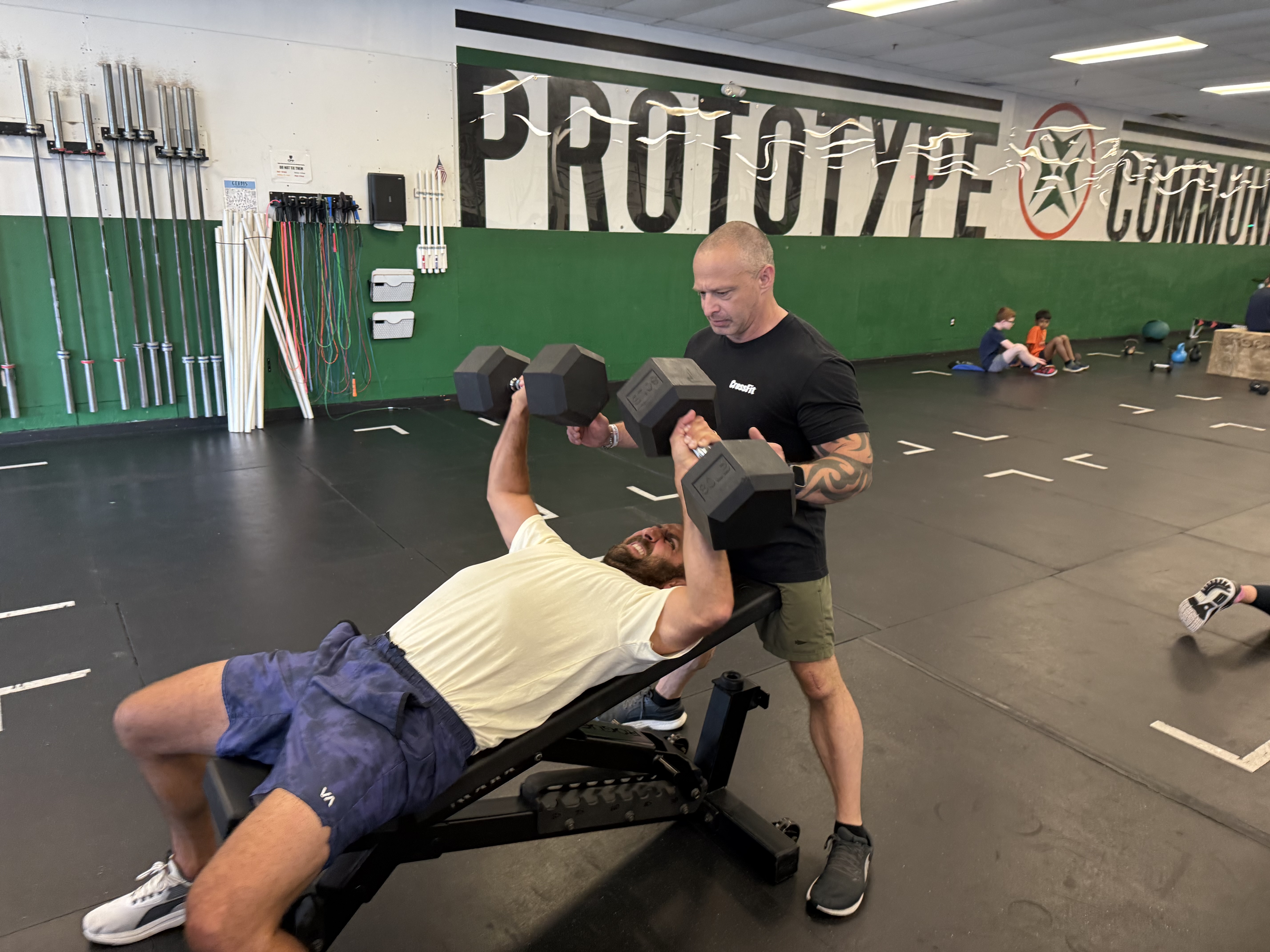 Ryan Barry lifting weights with Coach Tony Pittman at Prototype Training Systems