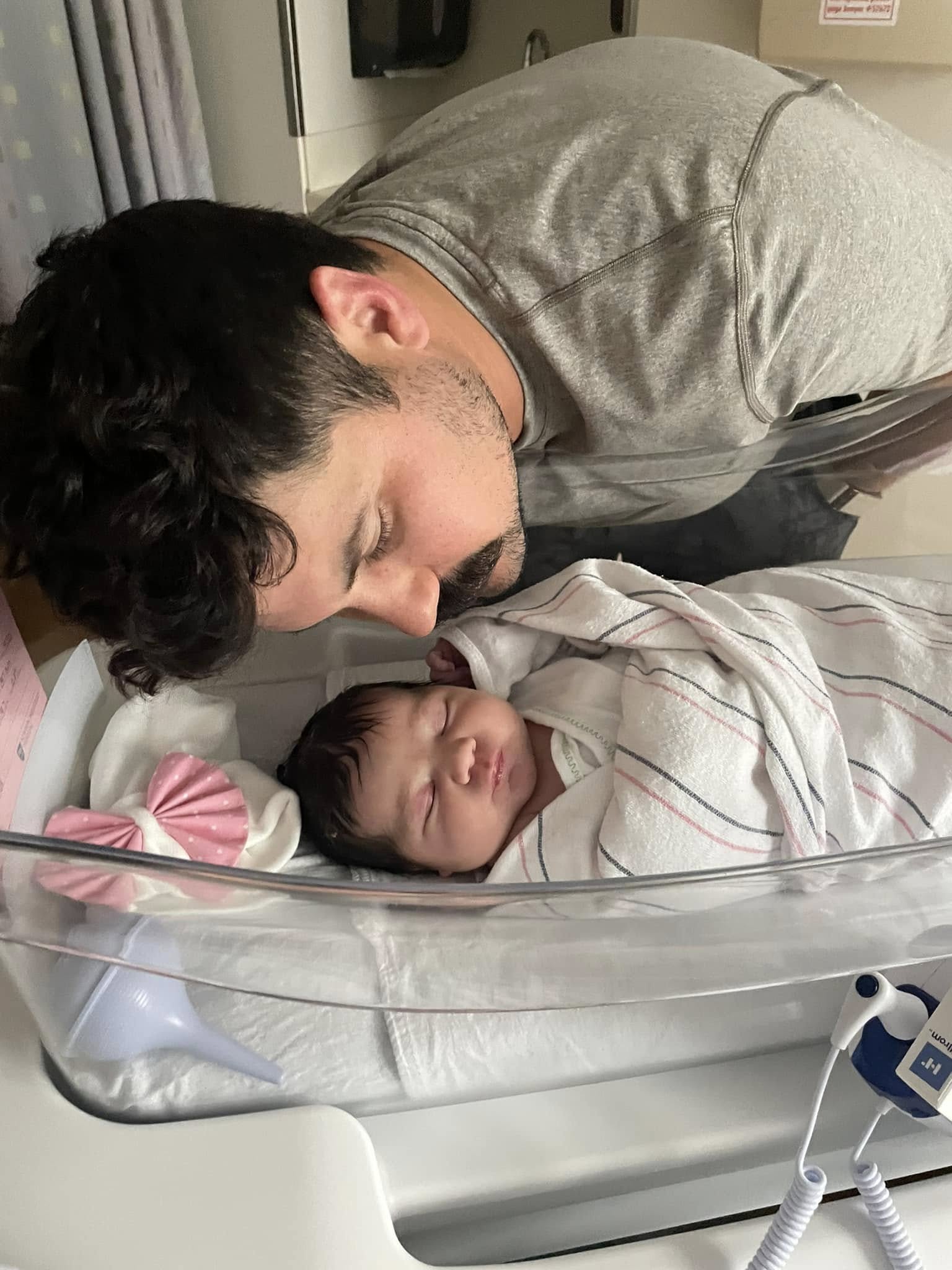 Keivan Russo with his newborn daughter Daria