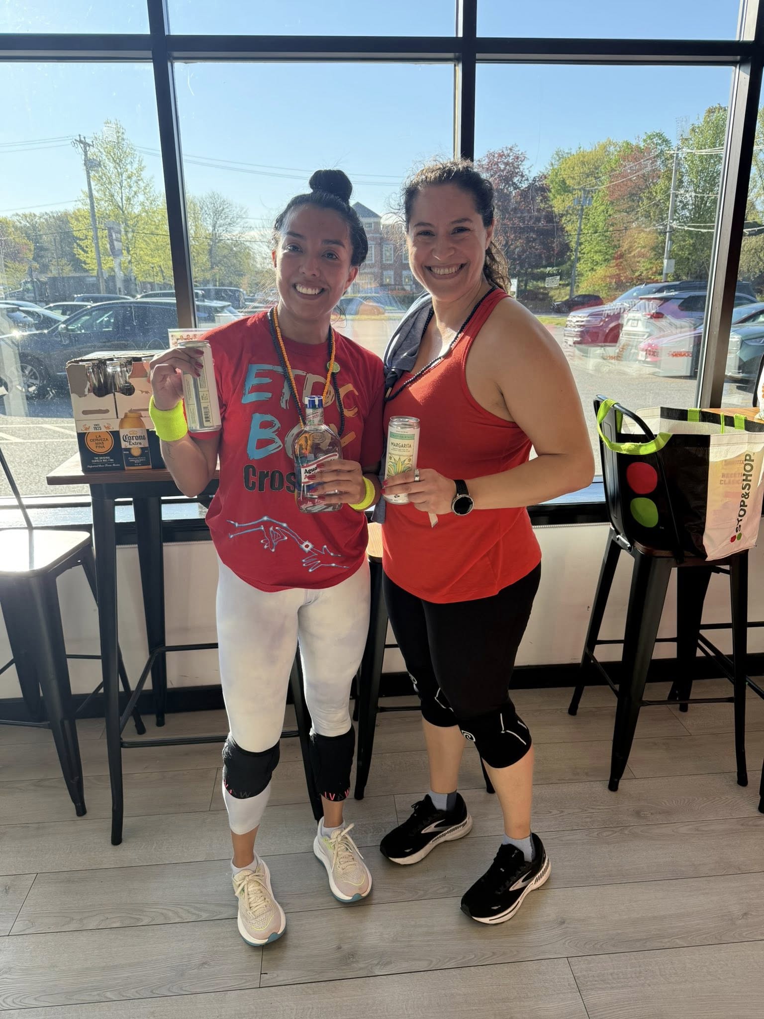 Melina Zamudio with her friend and training partner Carla Lopez at the 7:00 AM Ocho de Mayo celebration at Prototype Training Systems