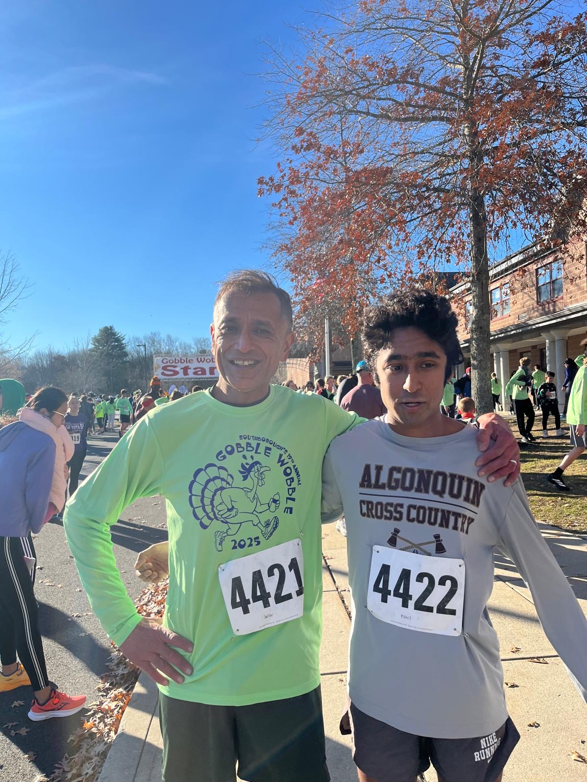 Safdar Medina and his son at the 2025 Turkey Trot