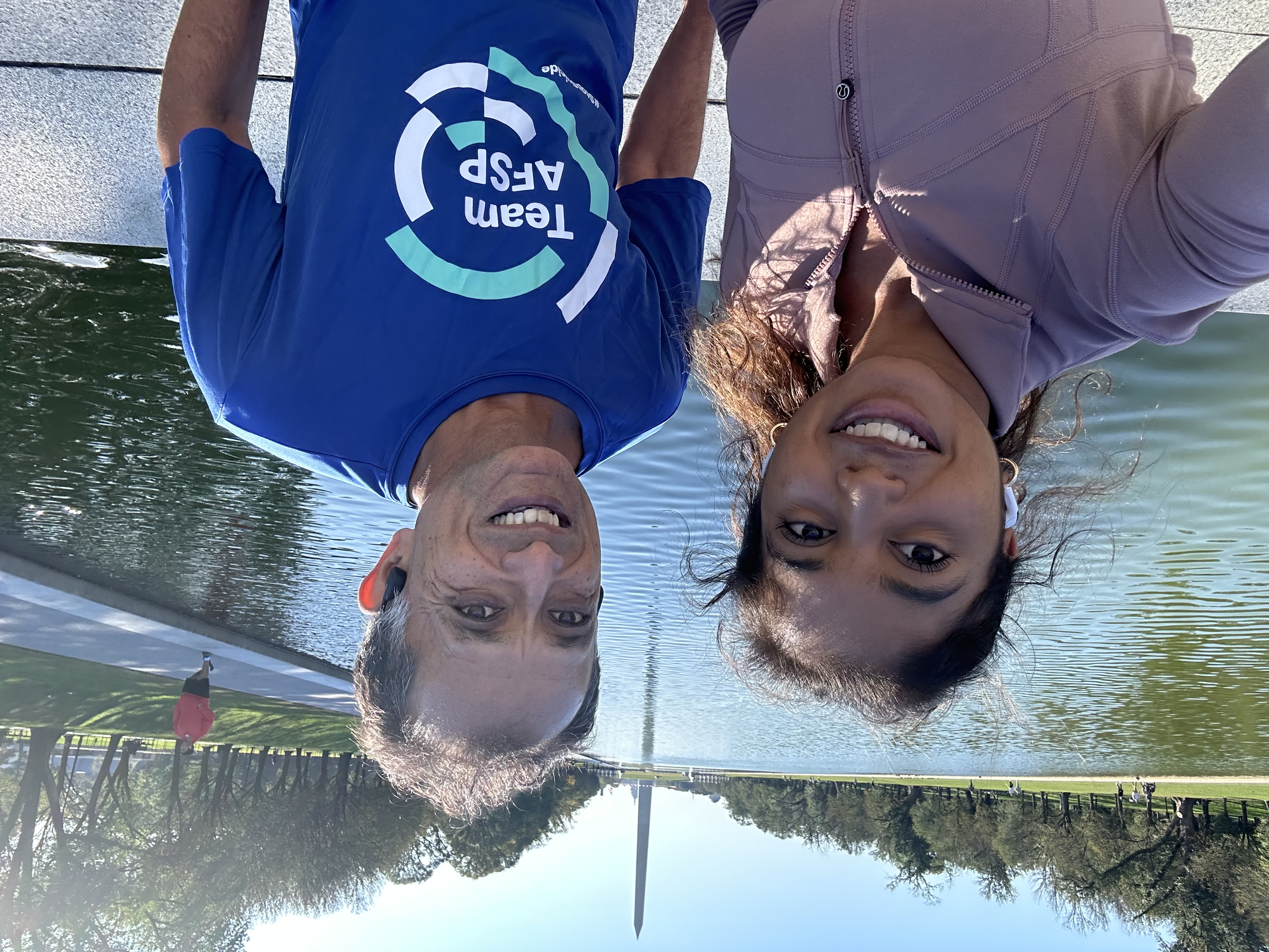 Safdar Medina running with his daughter in Washington, D.C.