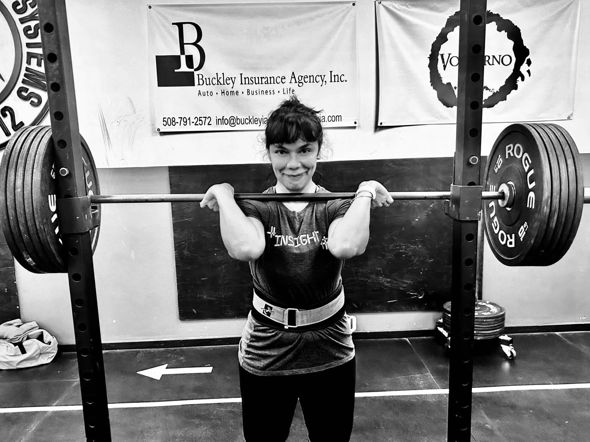 Mandy Pant lifting a barbell at Prototype Training Systems