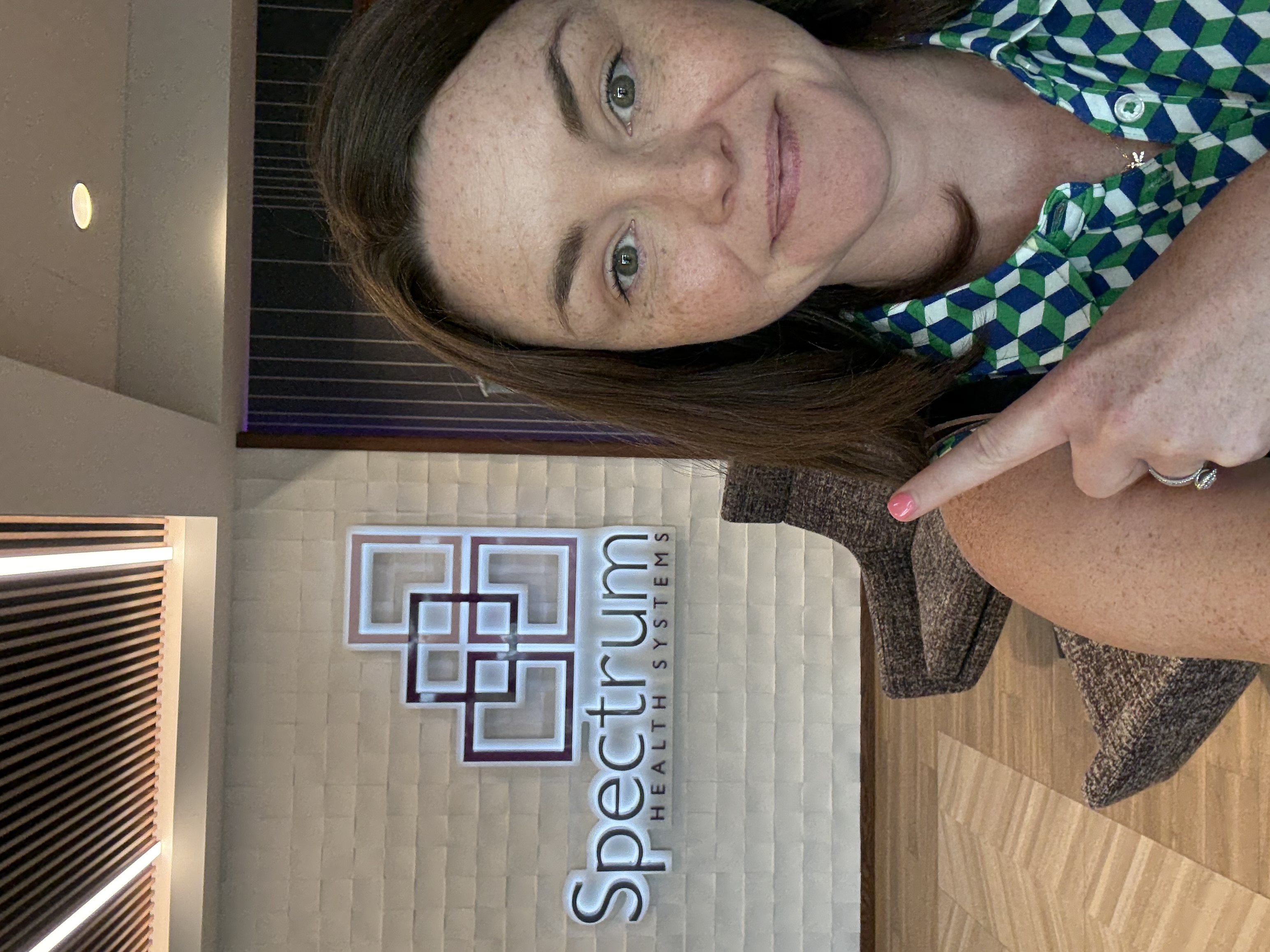Cori at her new job at Spectrum Health Systems