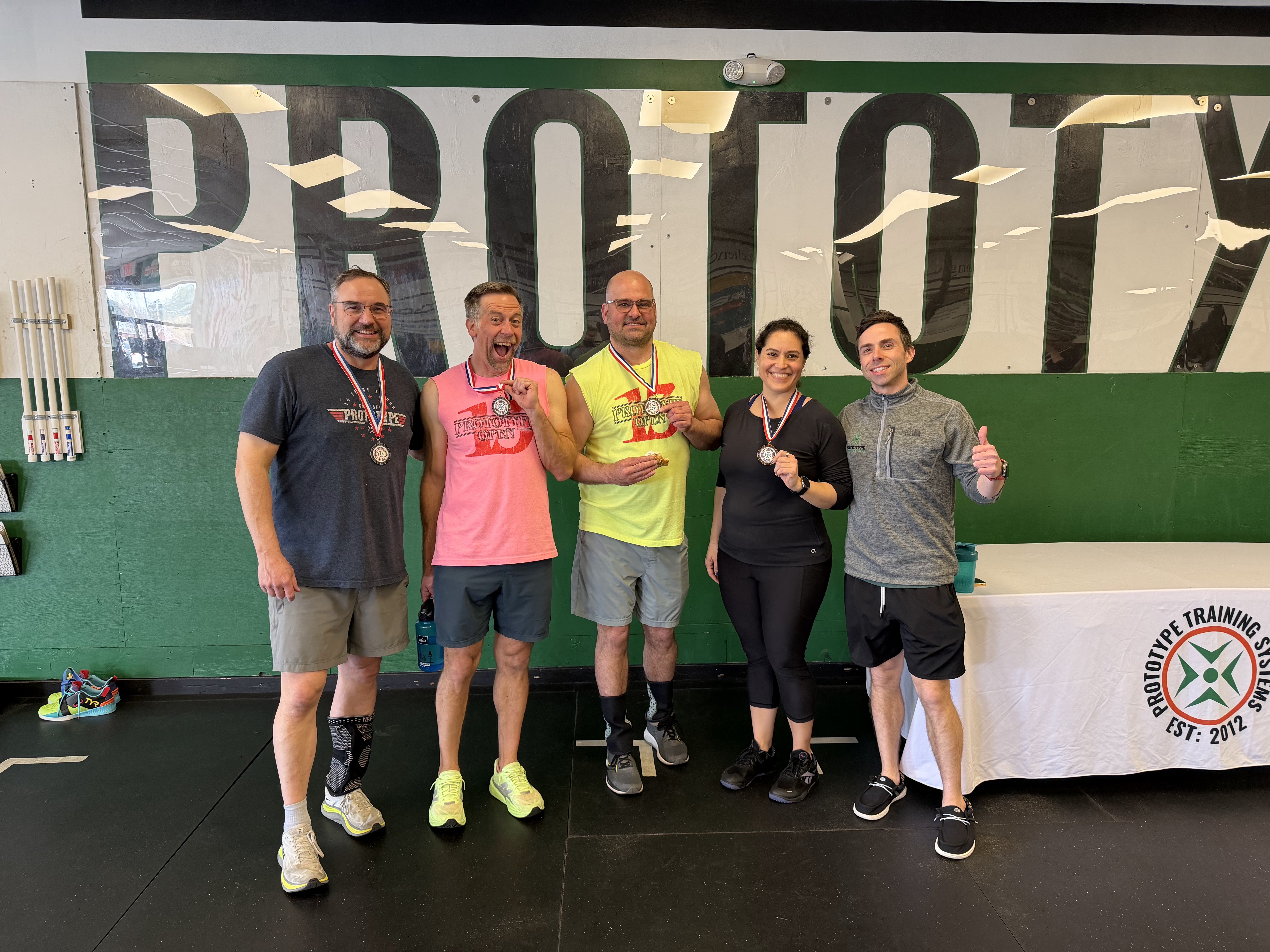 Rob with Mark, Damon, Carla, and Coach Jon after the 2026 Lift Off