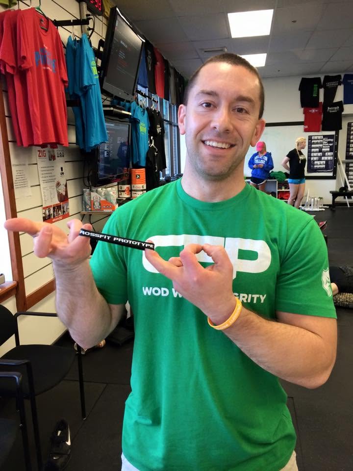 Garret St. Onge in his coach shirt earning his black Virtuosity performance band in 2015