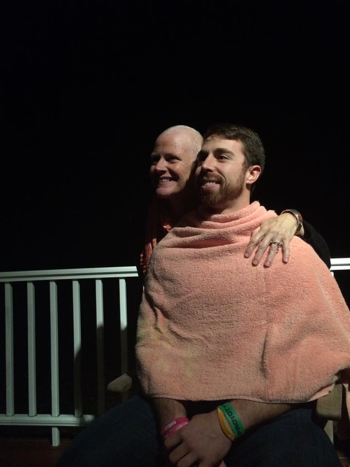Jean Hanks and Prototype founder Mike Collette with freshly shaved heads in November 2014, after teammates shaved theirs in solidarity