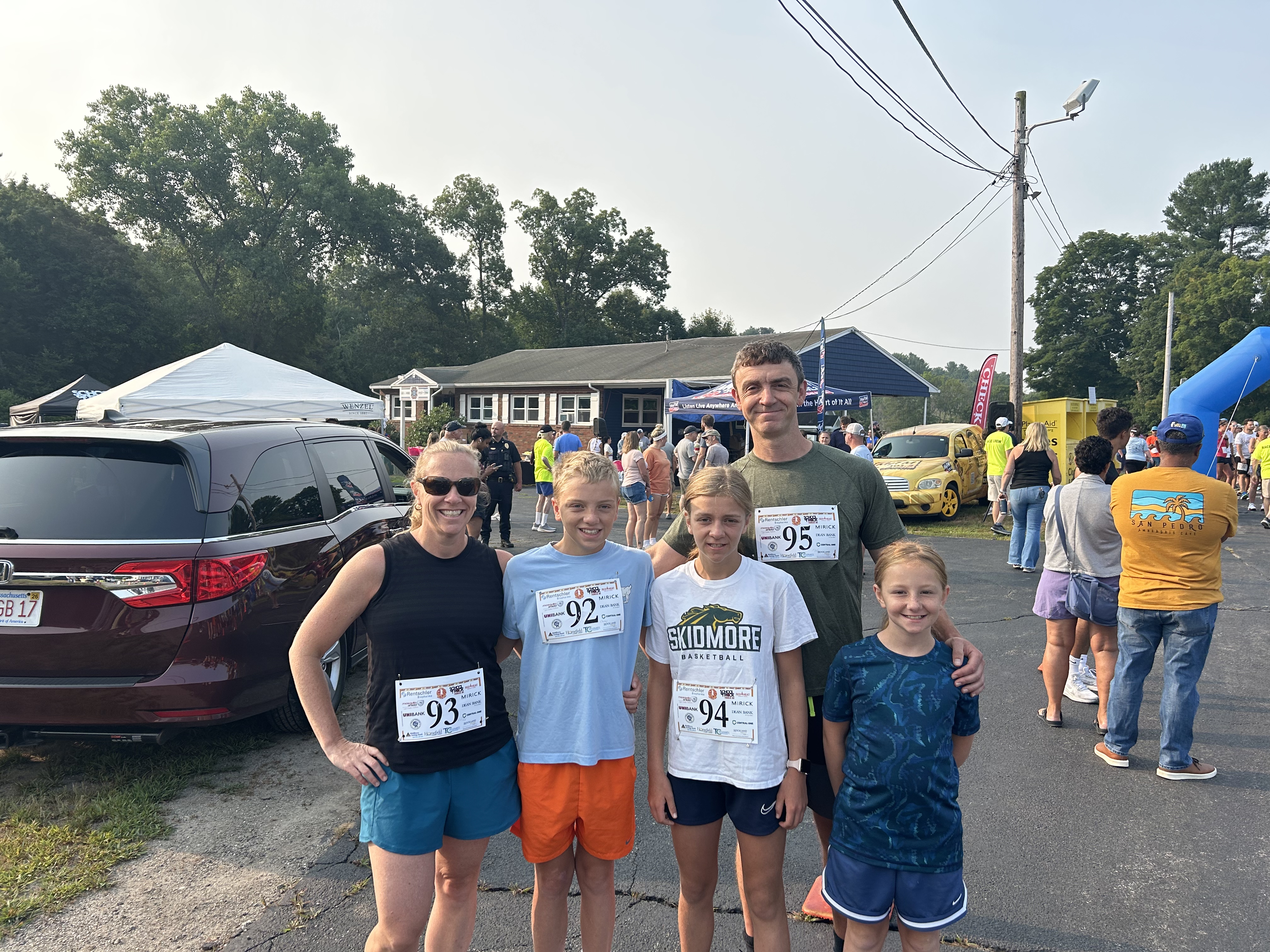 Josie Gualtieri with her parents and siblings after a 5K road race