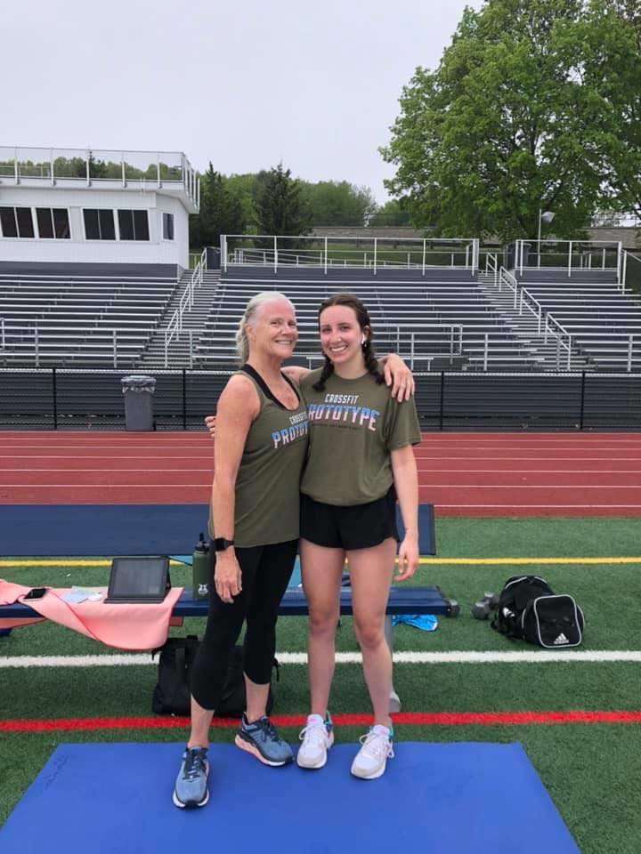 Jean Hanks and her daughter Lily after completing Murph at the Westborough High School track on Memorial Day 2020