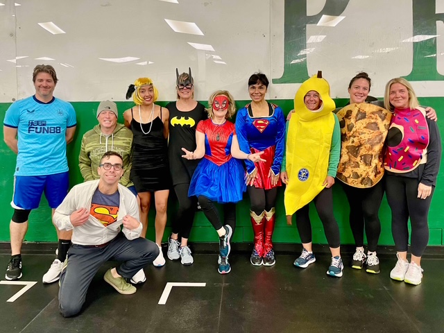 Anne in a Spider-Man dress with the 6am class at Prototype's WOD-O-WEEN