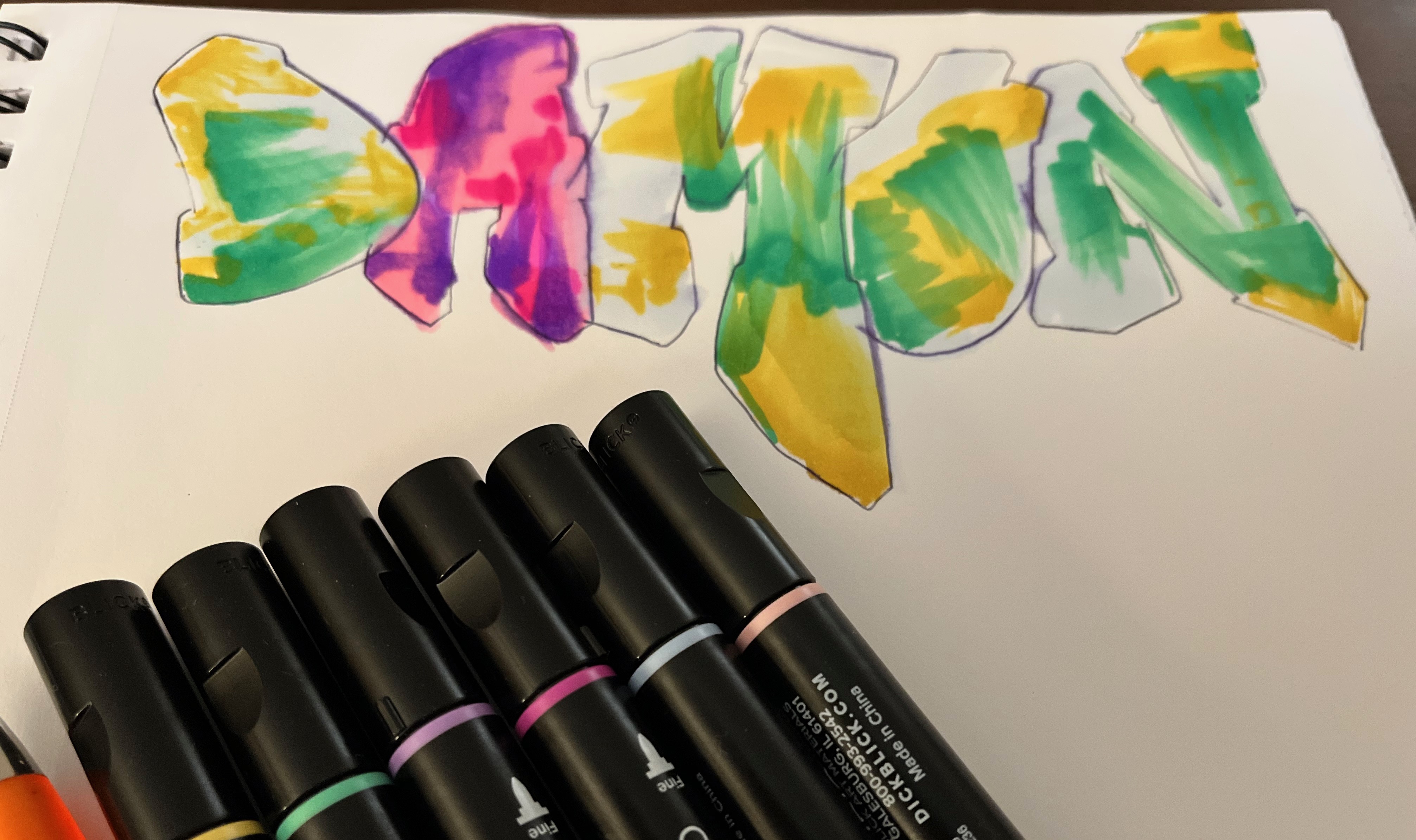 Graffiti-style drawing of his name by Damon Walsh