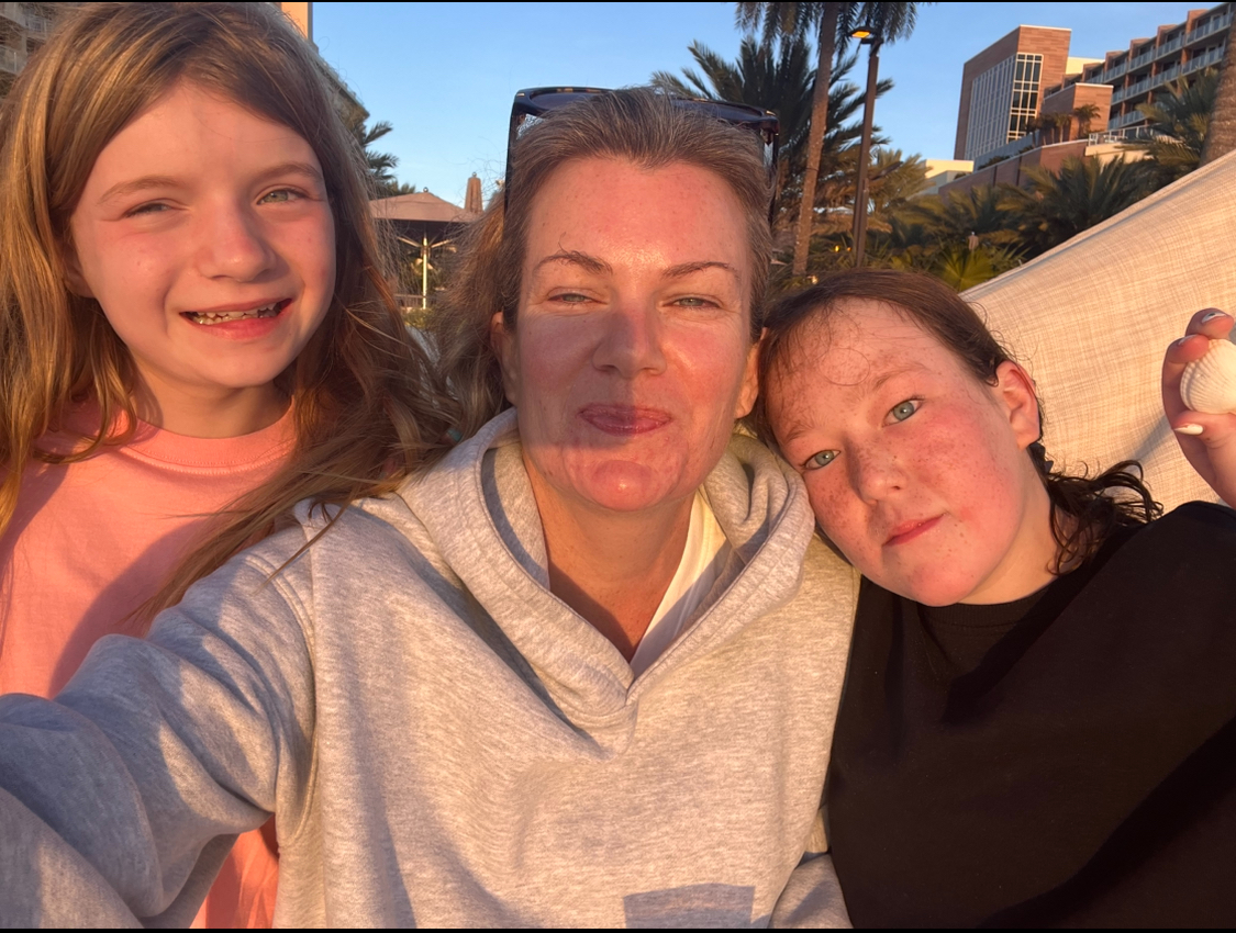 Molly Dulac with her mom Meghan and twin sister Anna