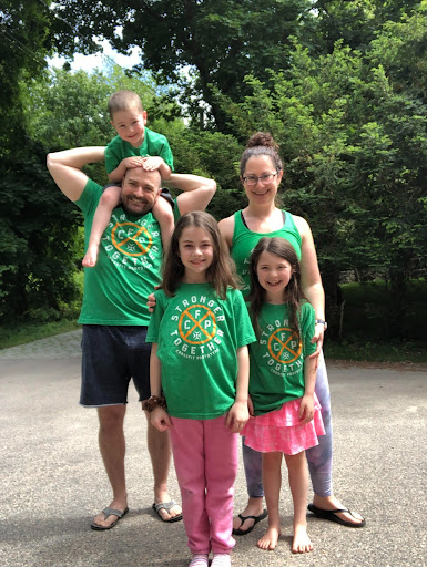 Shana Doiron with her husband Gerry and their kids in Prototype shirts