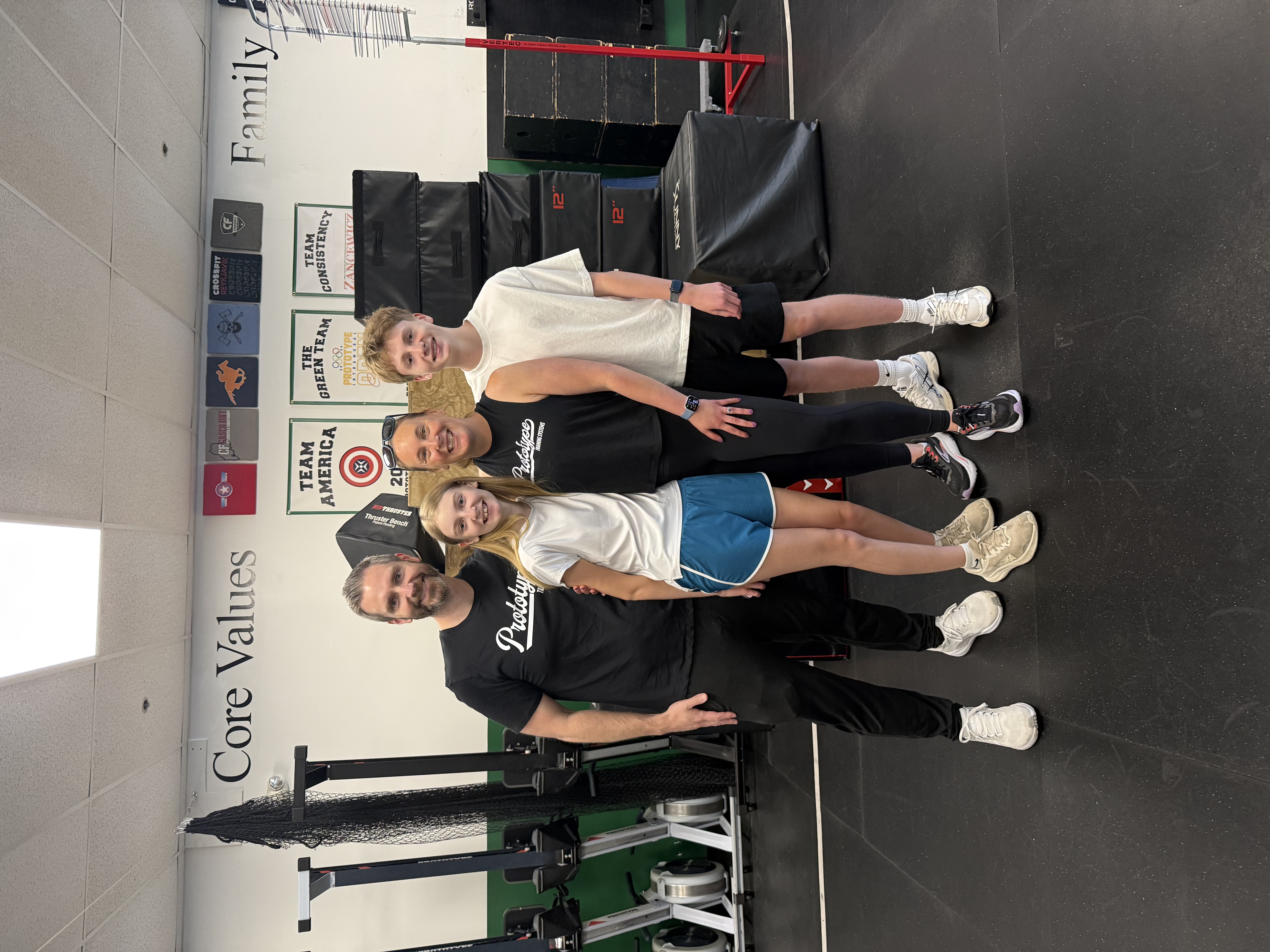 Chris and Heather Lacasse with their two kids at Prototype Training Systems