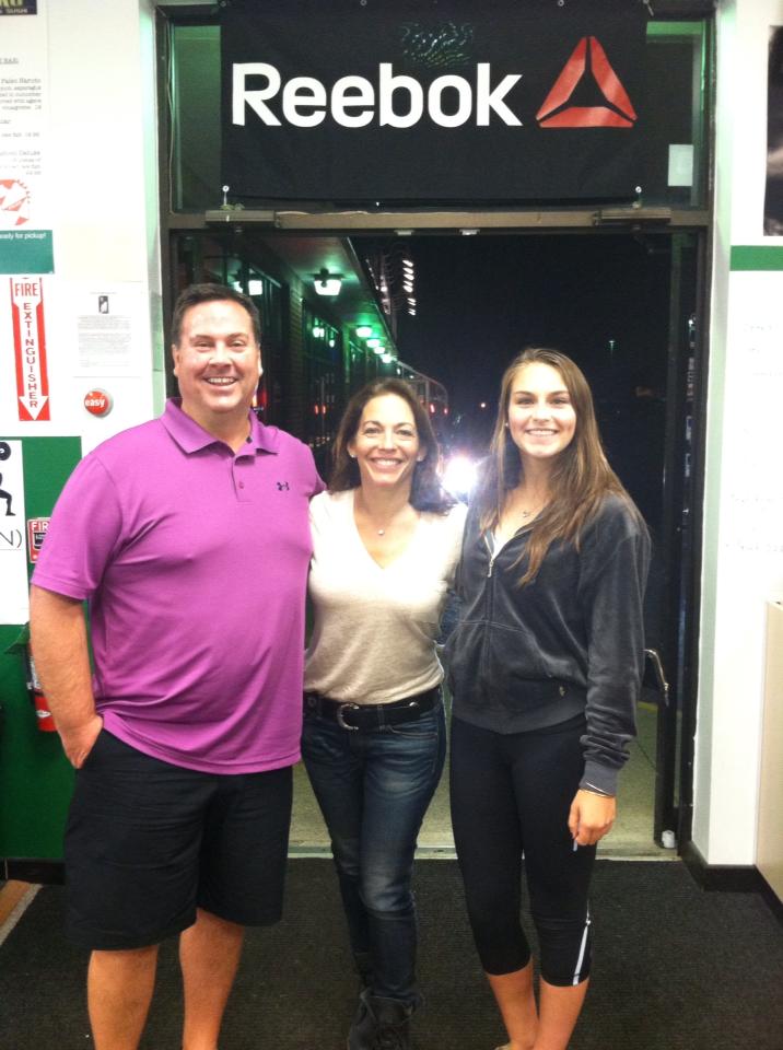 Brent, Sally, and Olivia Harwood at Prototype Training Systems in 2013 during a visit from Canada