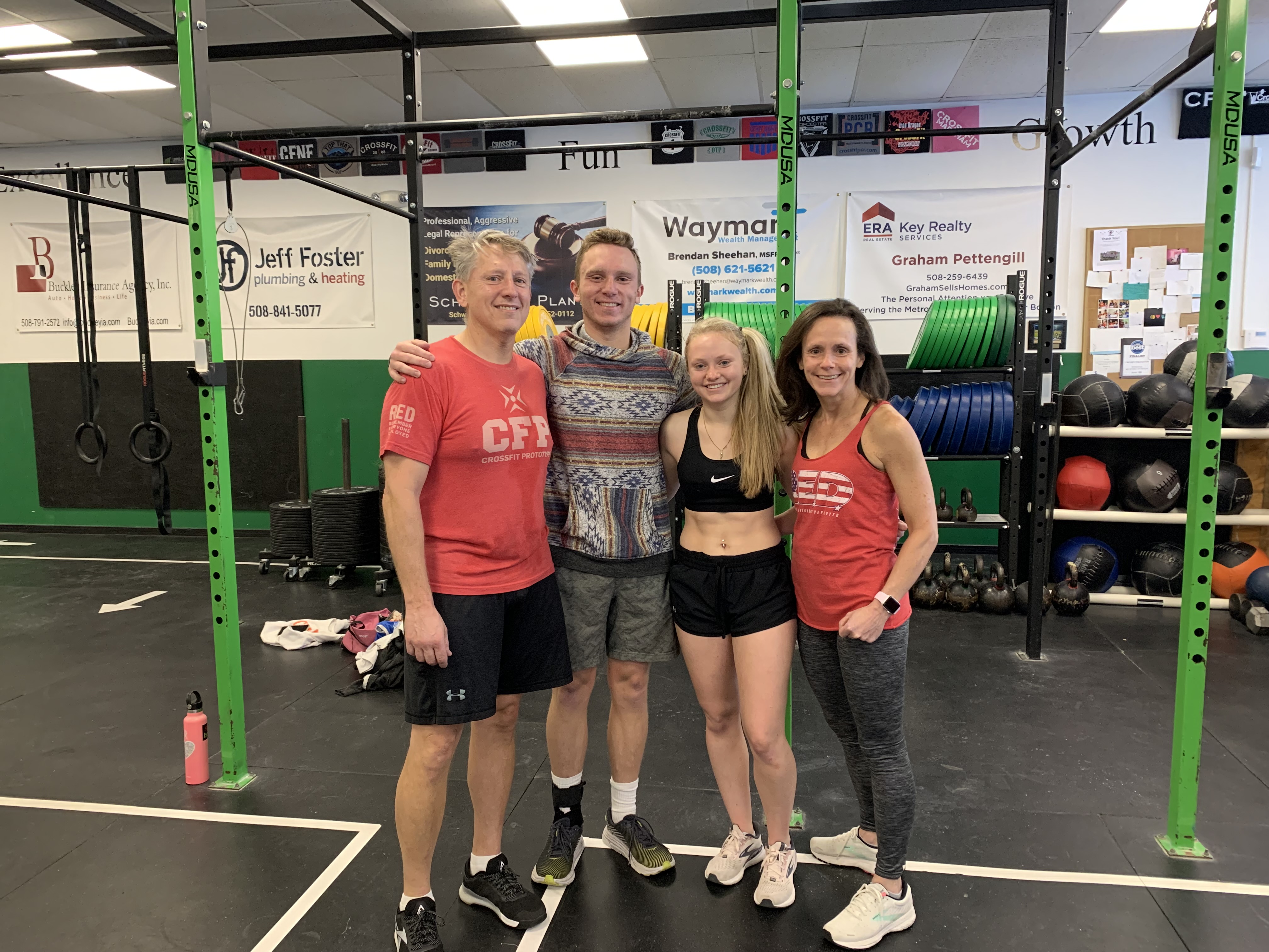 Carl and Jackie Donadio with their kids after a Murph workout at Prototype